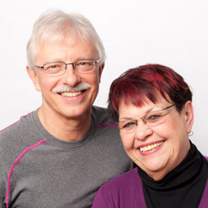 Elderly man and woman smiling